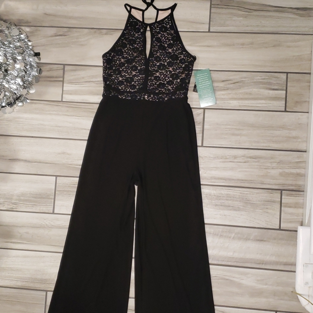 Jumpsuit by: R & M Collection. - Picture 3 of 15